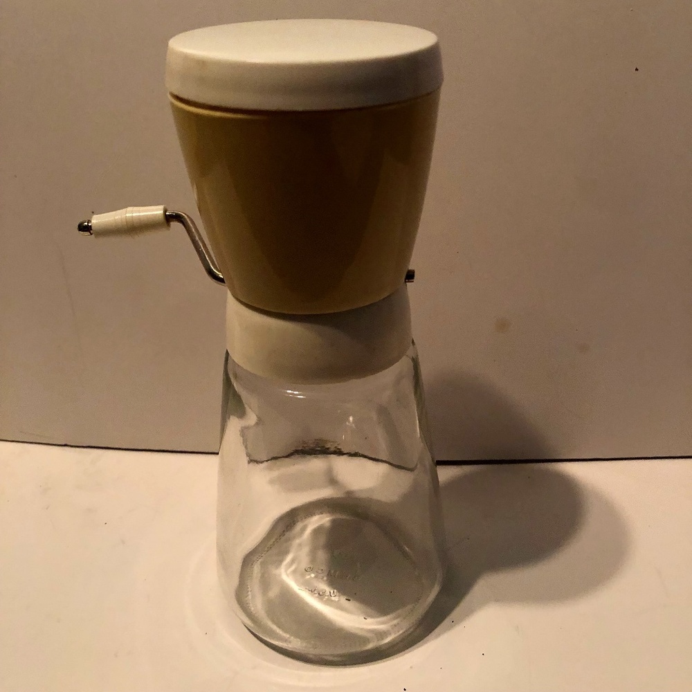 Retro Gemco nut grinder, comes with glass bottom, plastic grinder and lid.
